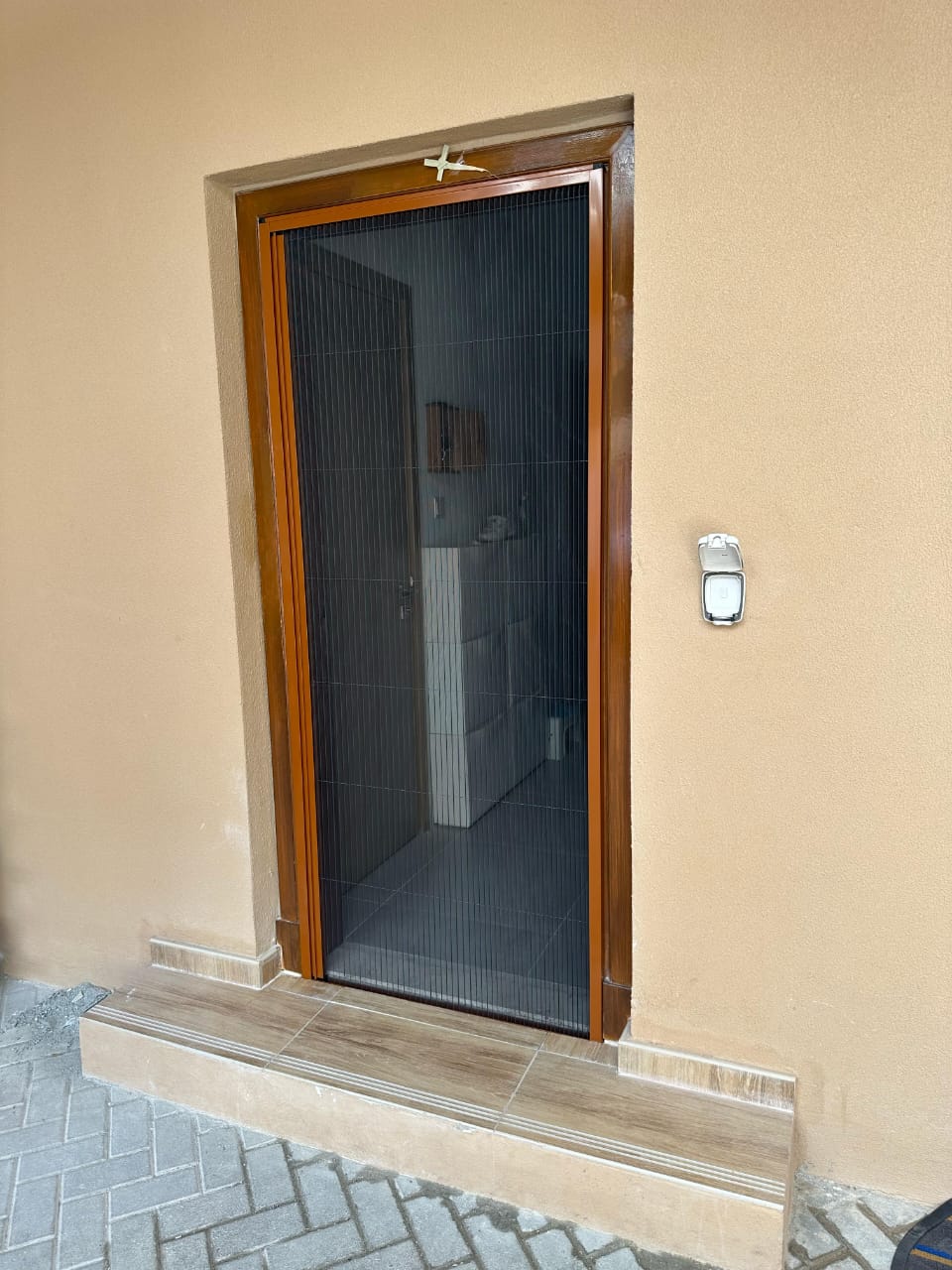 a picture of single fly screen solutions in dubai placed at a house.