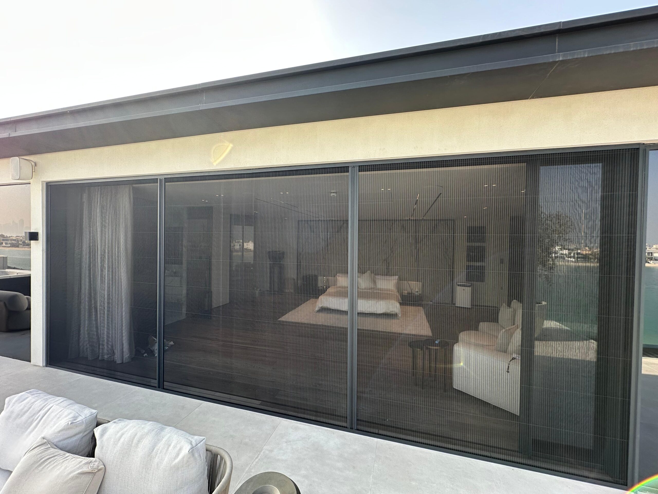 Wide fly screen installed on a Dubai balcony with panoramic view