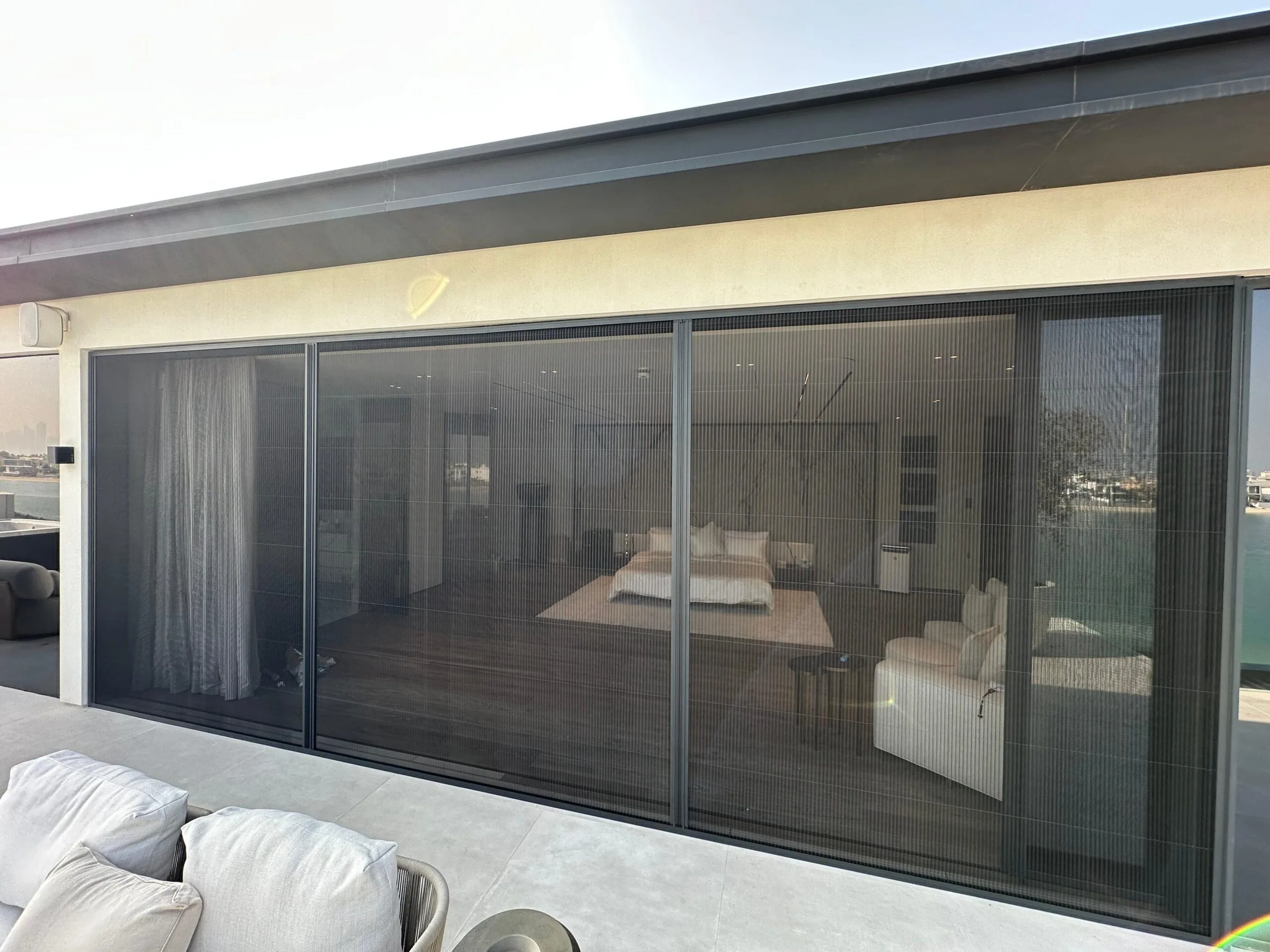 Wide fly screen installed on a Dubai balcony with panoramic view