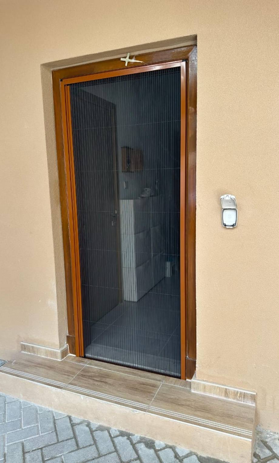 a picture of single fly screen solutions in dubai placed at a house.