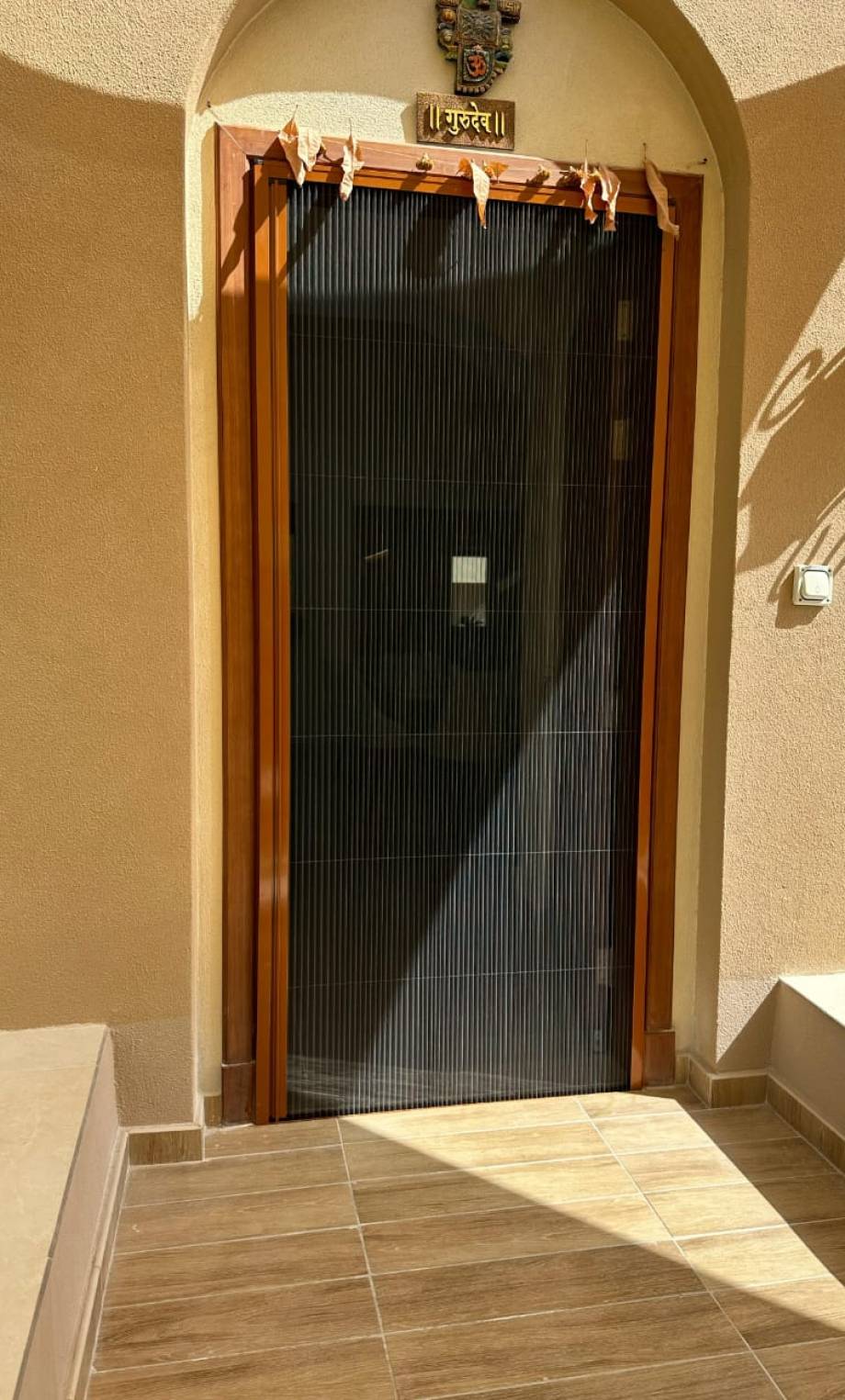 a picture of single fly screen in dubai placed at a house.